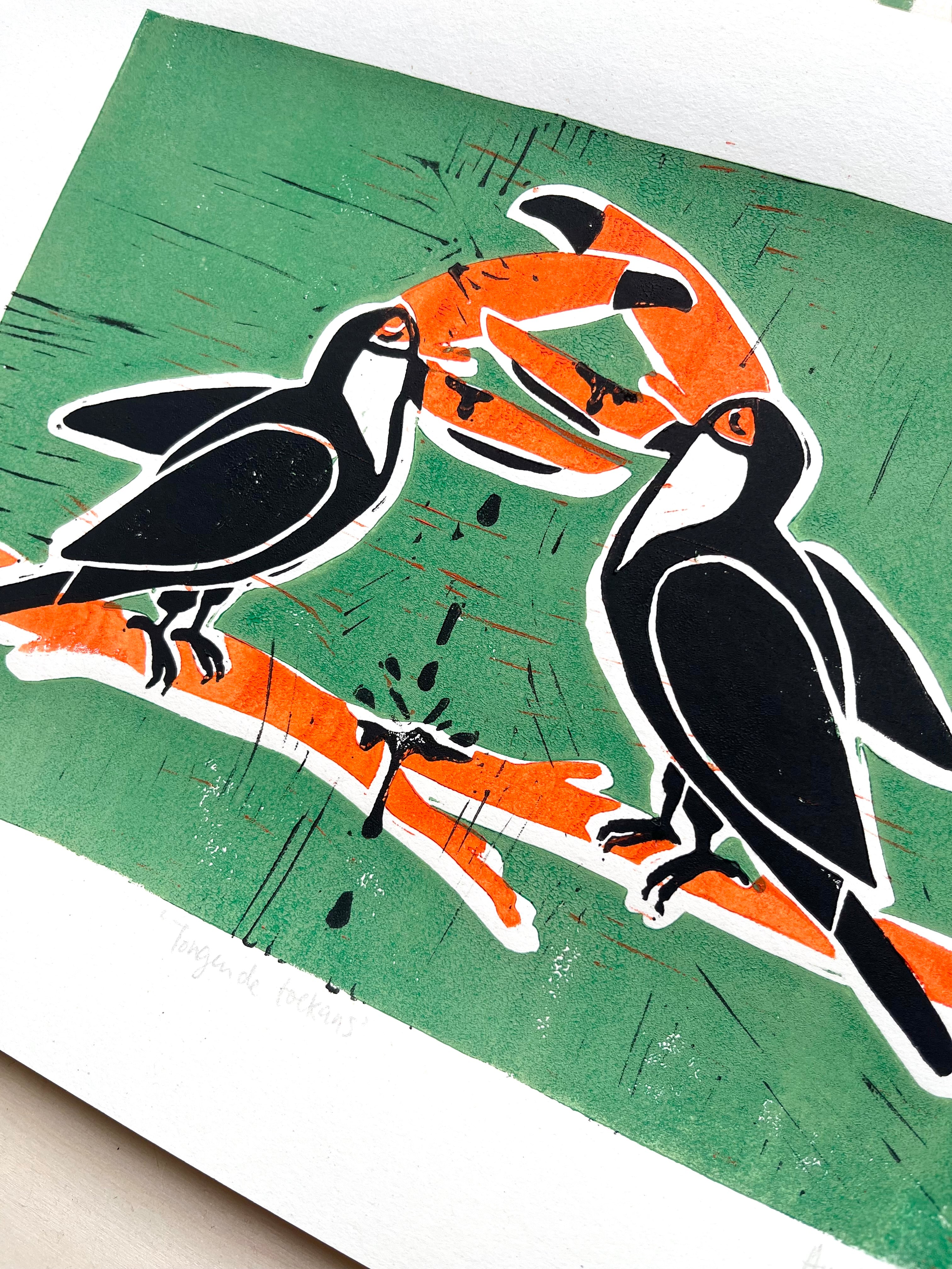 Handgemaakte linoprint door Anne Neuteboom cabaretier met tekening van tongende toekans Anne Neut Boetiek