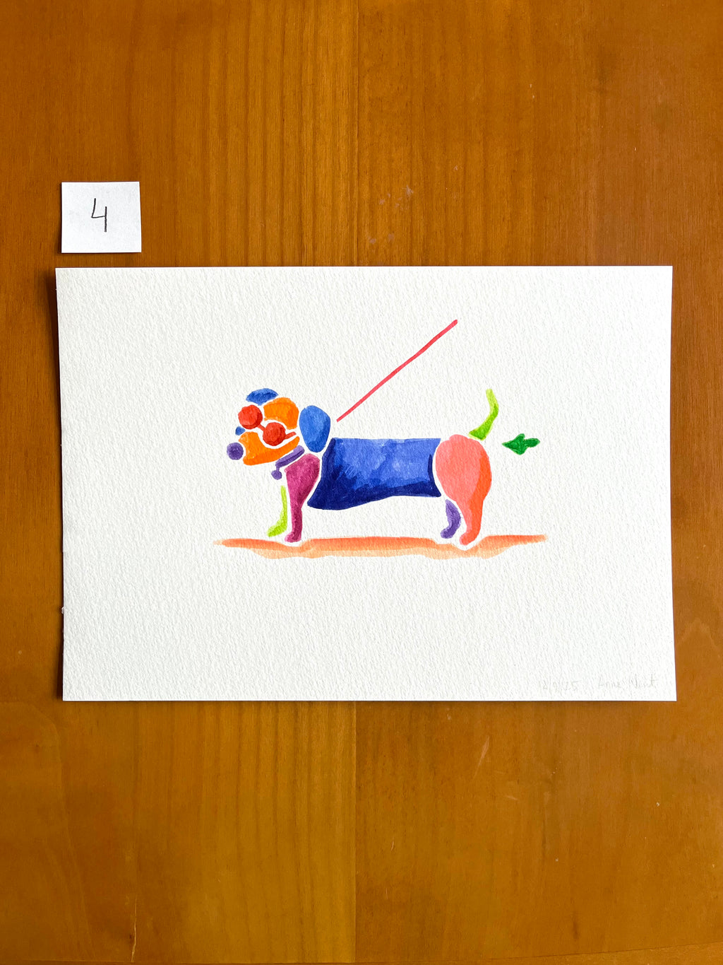 Tekening van teckel die een scheetje laat met aquarel markers op aquarel-papier door Anne Neuteboom cabaretier Anne Neut Boetiek