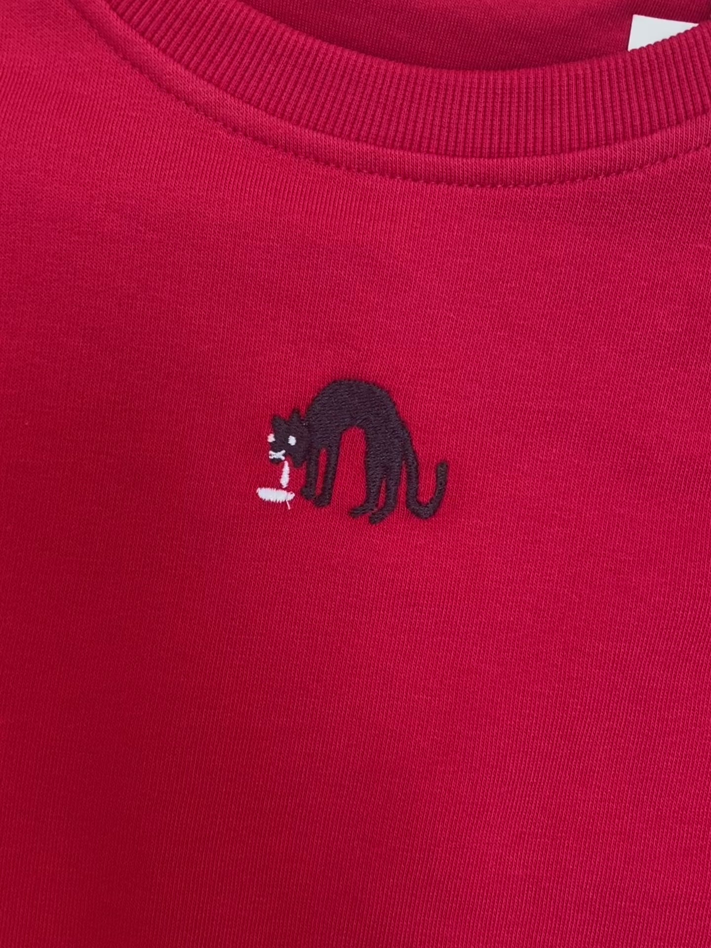 Unisex BIO sweater Kotsende Kat Anne Neuteboom cabaretier Anne Neut Boetiek